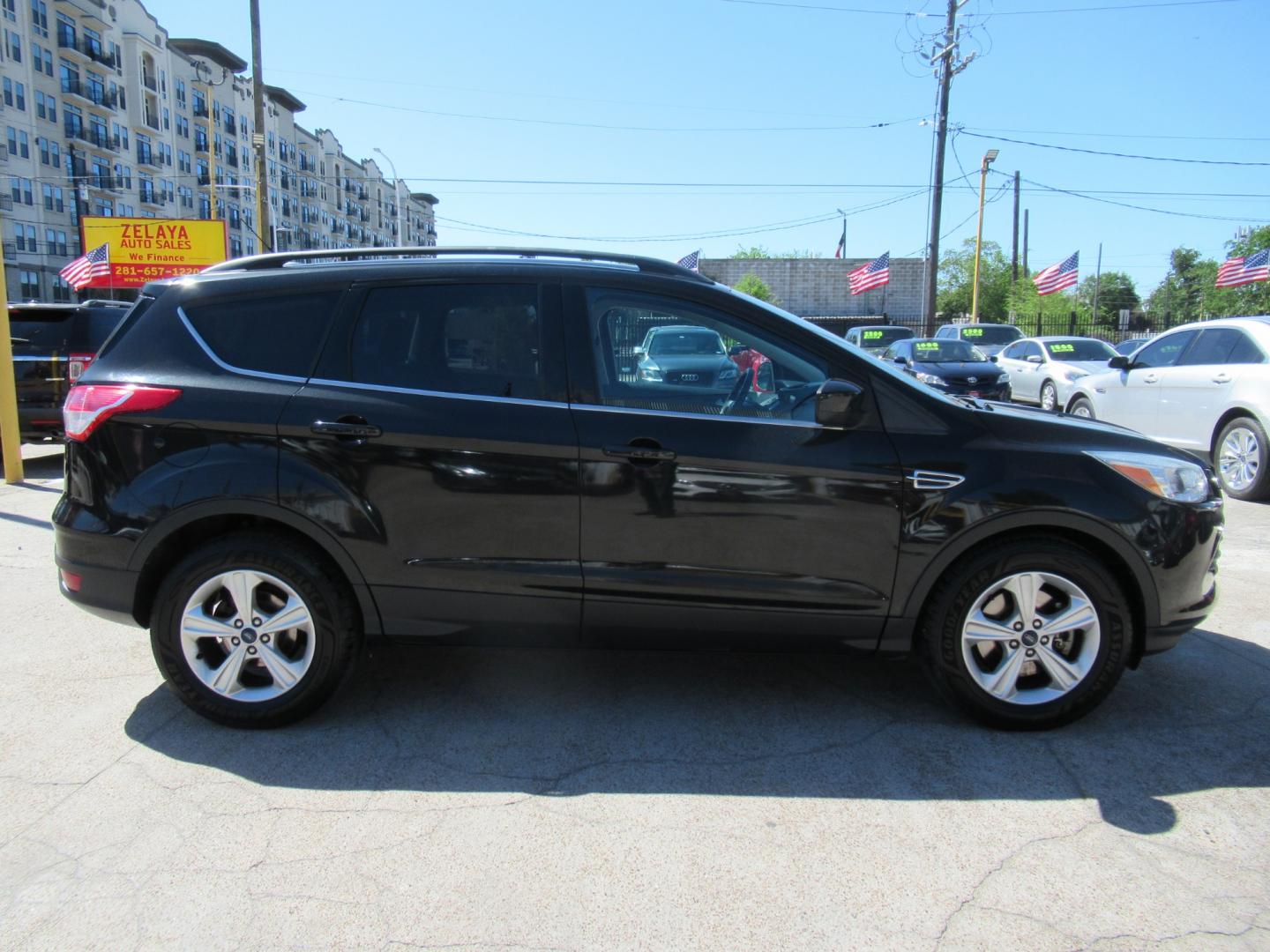 2014 Black /Black Ford Escape SE 4WD (1FMCU9GX5EU) with an 1.6L L4 DOHC 16V engine, Automatic transmission, located at 1511 North Shepherd Dr., Houston, TX, 77008, (281) 657-1221, 29.798361, -95.412560 - 2014 FORD ESCAPE SE VIN: 1FMCU9GX5EUC37295 1 F M C U 9 G X 5 E U C 3 7 2 9 5 4 DOOR WAGON/SPORT UTILITY 1.6L I4 F DOHC 16V GASOLINE FRONT WHEEL DRIVE W/ 4X4 - Photo#22